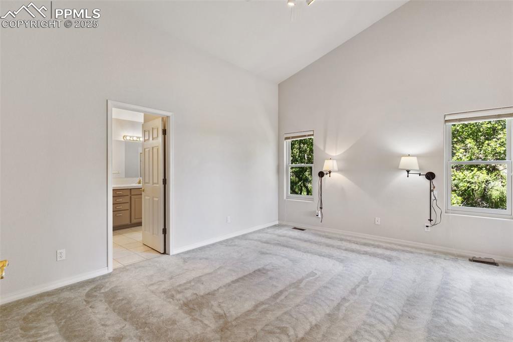 Sliding doors to deck and vaulted ceilings