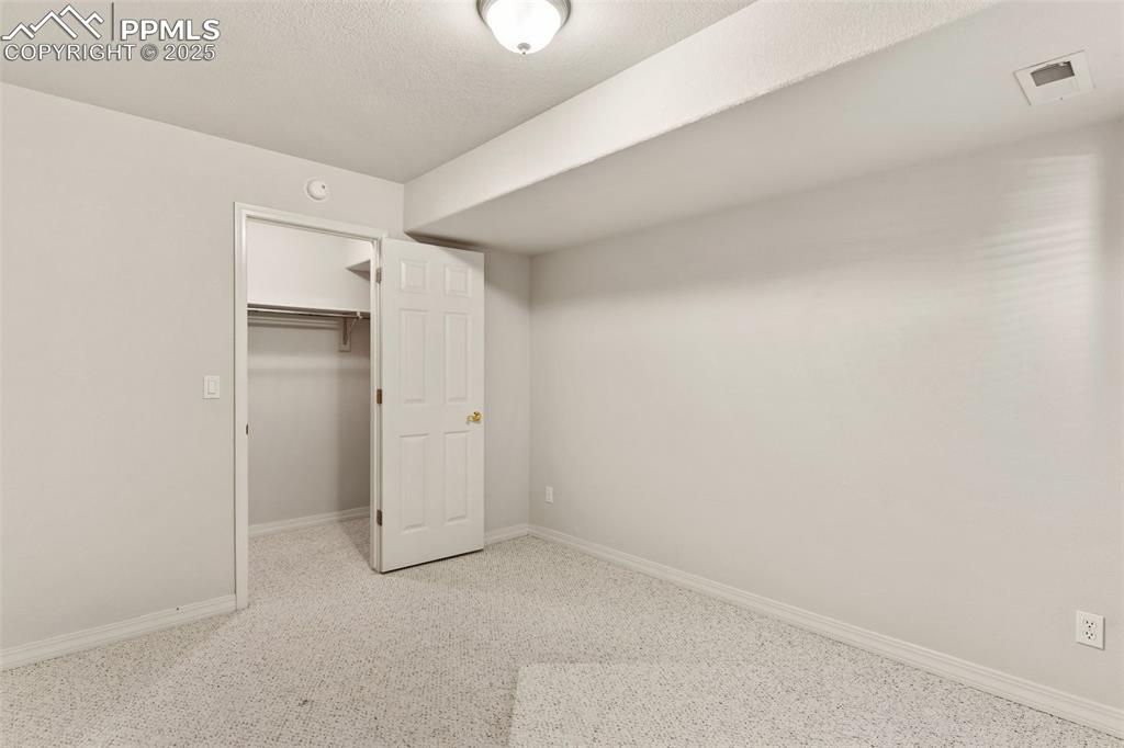 Bedroom in lower level with spacious closet