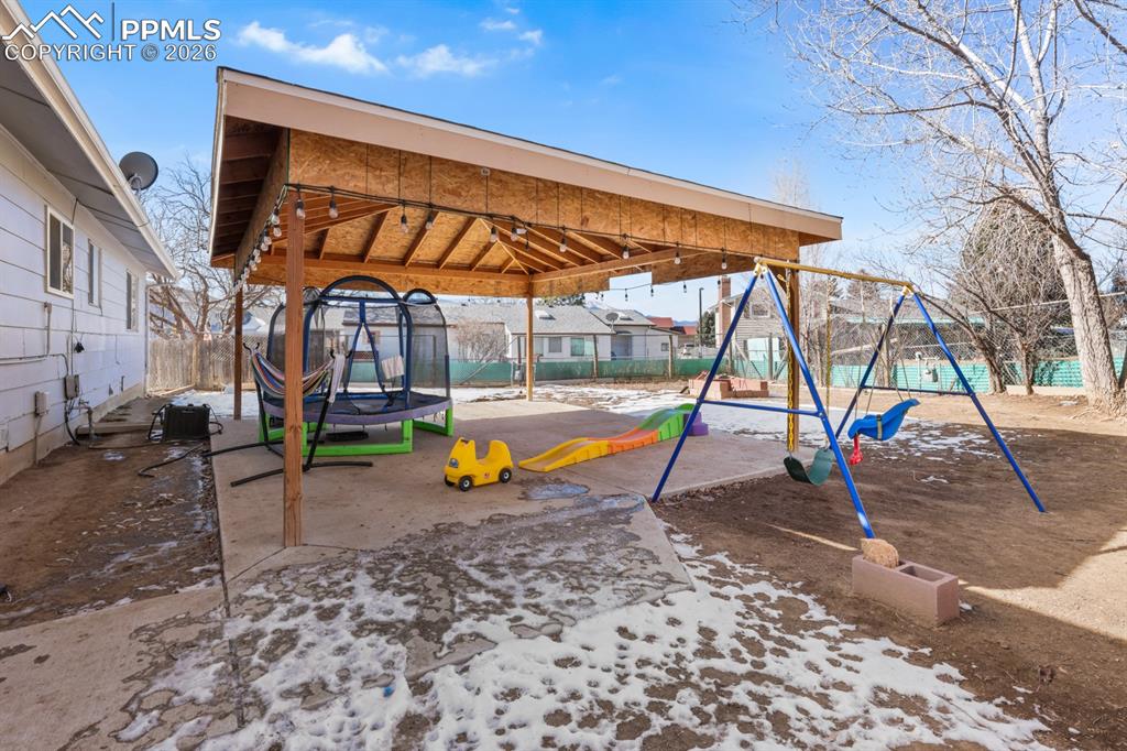 Community play area featuring a patio