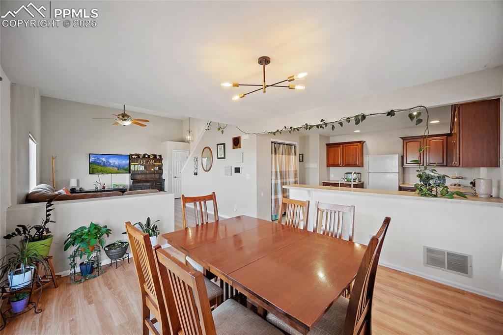 Dining area with modern lighting
