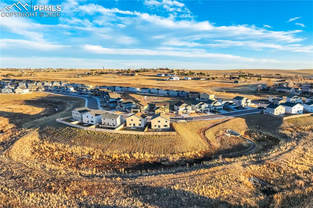 Open space behind home with trails. 