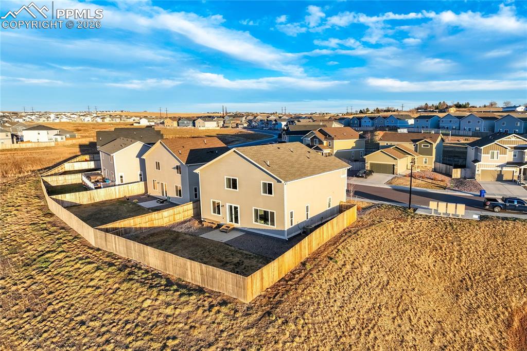 Open space behind home with trails. 