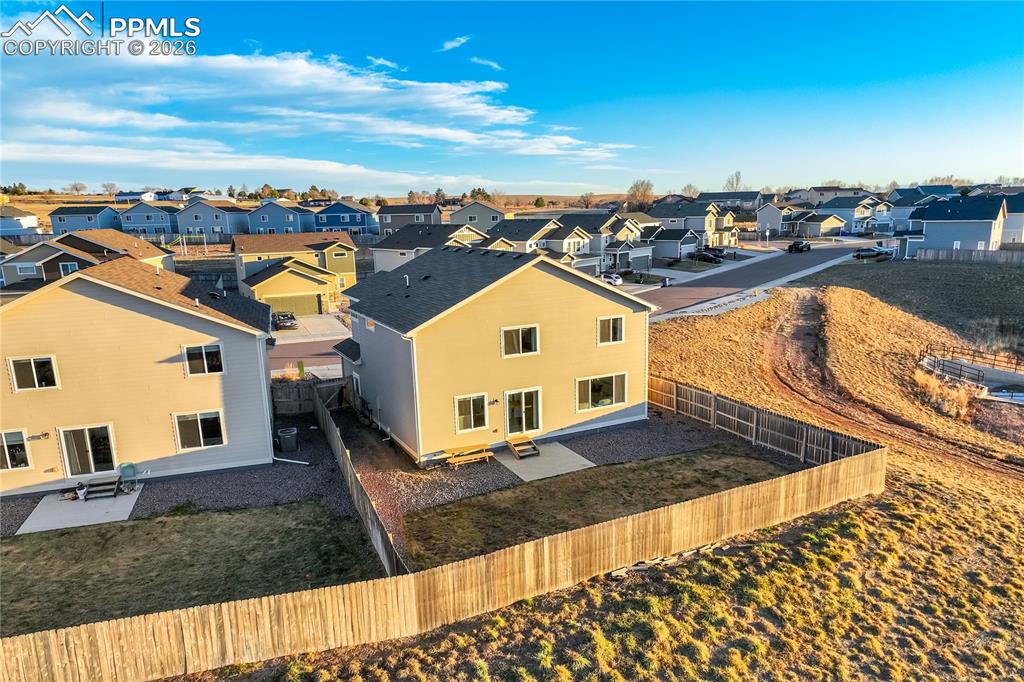 Open space behind home with trails. 