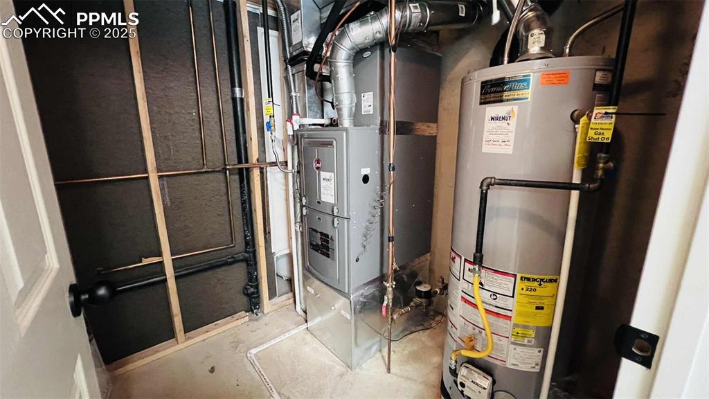 Utilities featuring gas water heater and heating unit