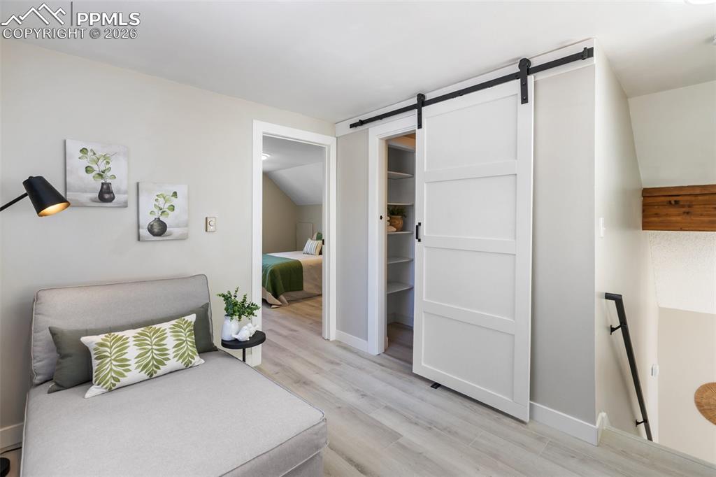 Lofted seating area with 3/4 bath adjacent, and owners suite attached