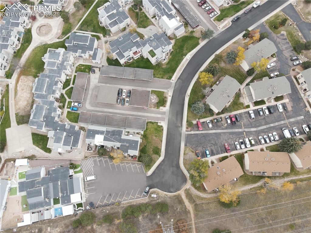 View of property location with nearby suburban area