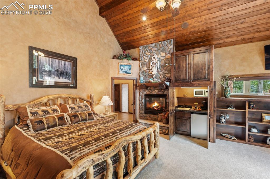 And, as you enter the Primary...you will love the space, the warm touches and you even have your own wine or coffee bar!