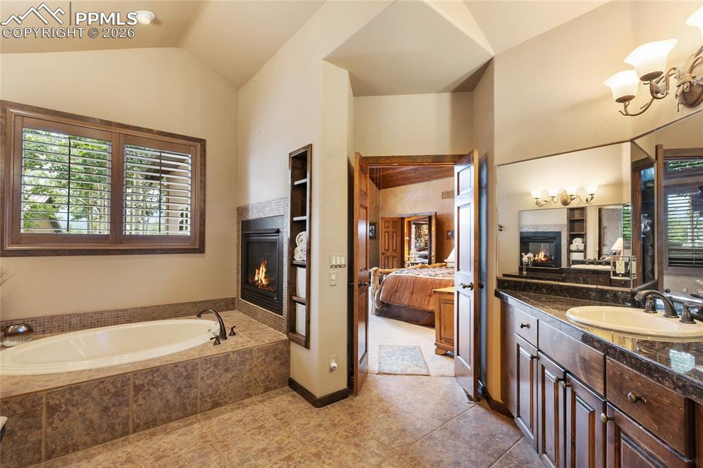 You can even enjoy the soaking tub and your very own fireplace in the Primary bathroom.
