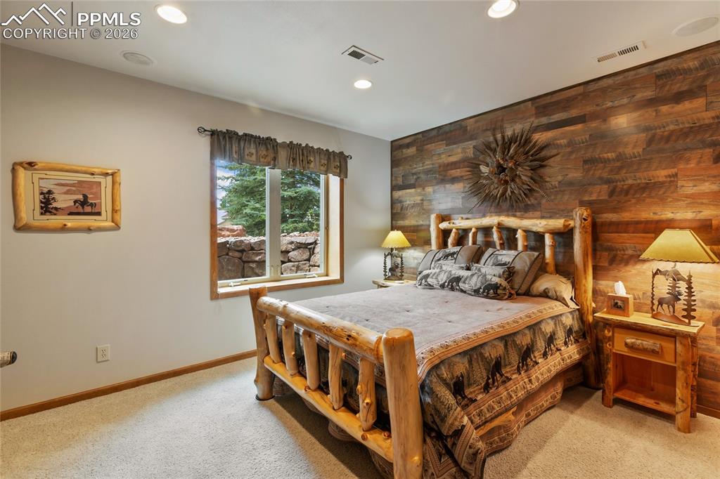You will find 2 additional bedrooms on the lower level, 1 of 2