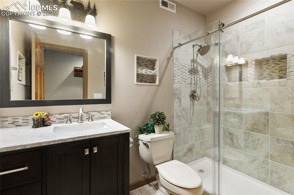 You will find 2 additional bedrooms on the lower level, 1 of 2