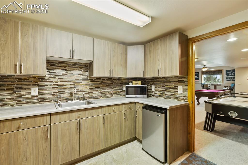 And how much do you love having a kitchenette here too?  Great for guests and multi generational living.