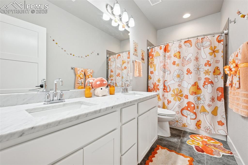 All bathrooms in the home are large, upgraded and gleaming.