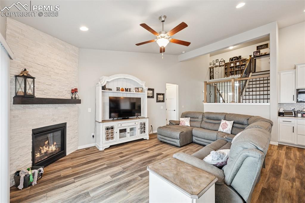 Living room featuring fireplace and great room feel. Open, light and bright! Perfect for entertaining.