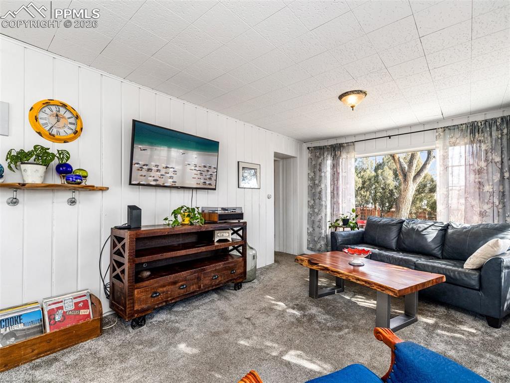 On the south side of the house sits this sunroom with wall to wall windows. 