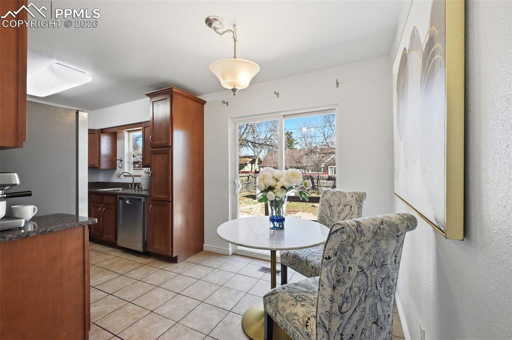 Walks out to the back patio