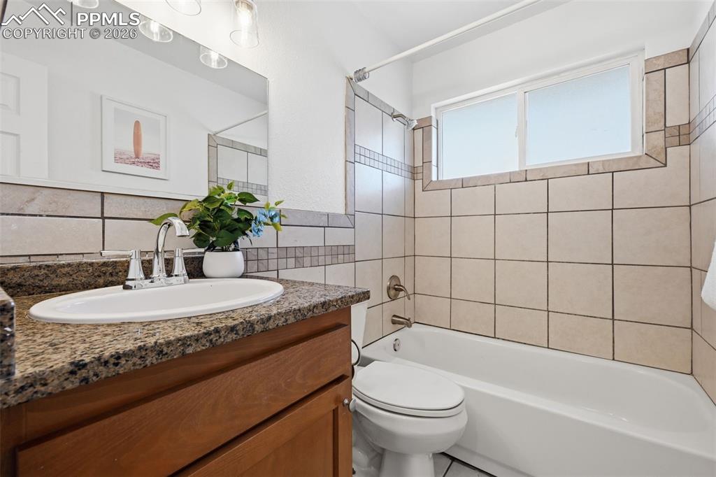 Main level full bath with large window