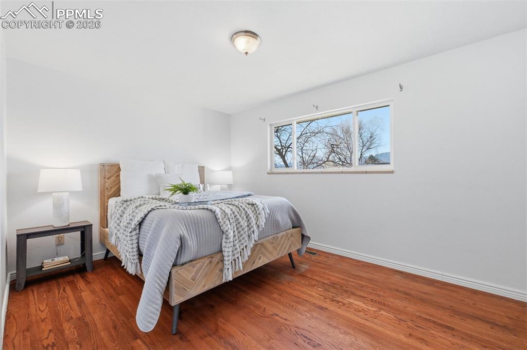 Spacious Bedroom with real wood floors