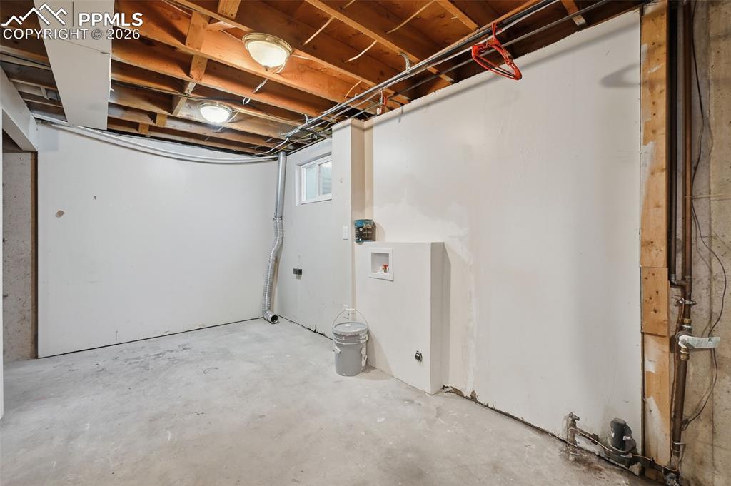 Unfinished storage/laundry space