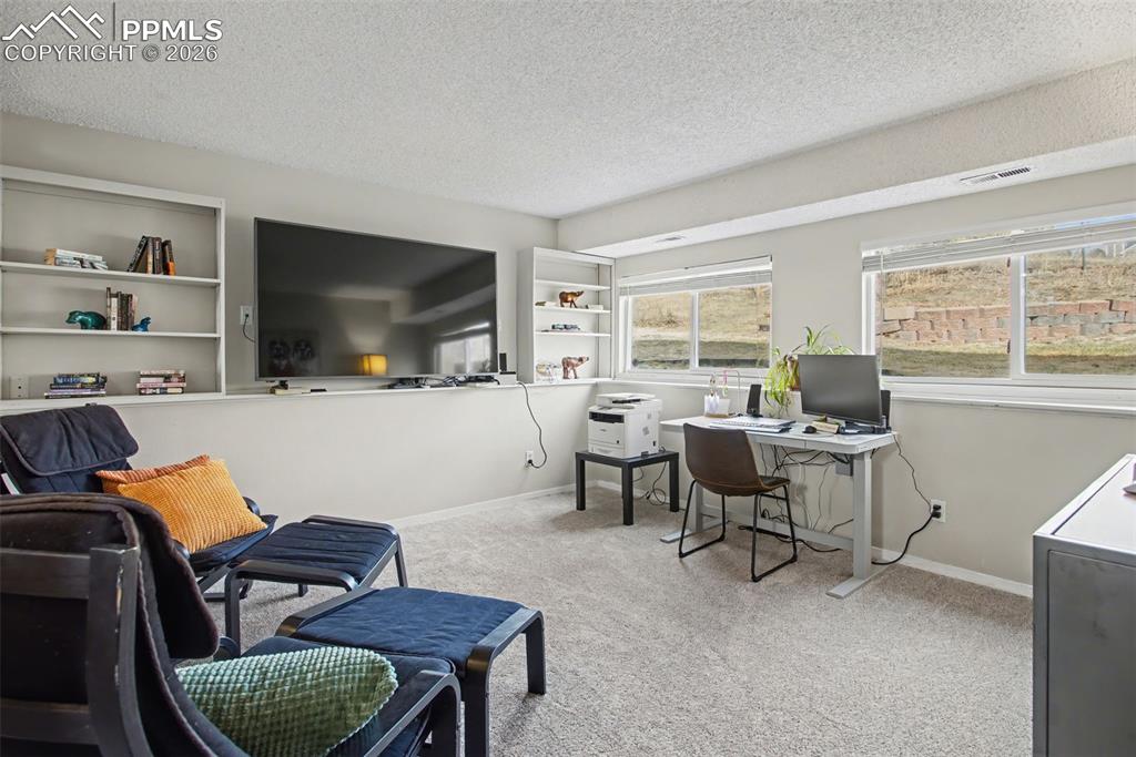 Family room with built-in shelving