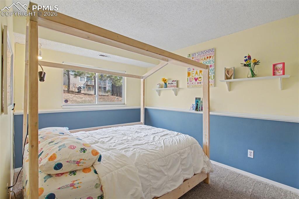 Lower level light and bright bedroom