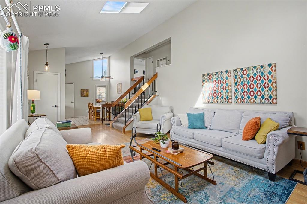 Living room with view into dining area