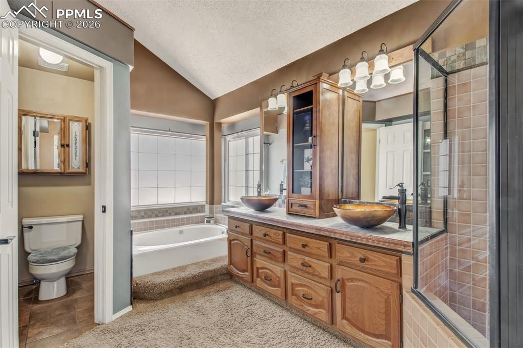 5-piece bathroom connected to the master bedroom.