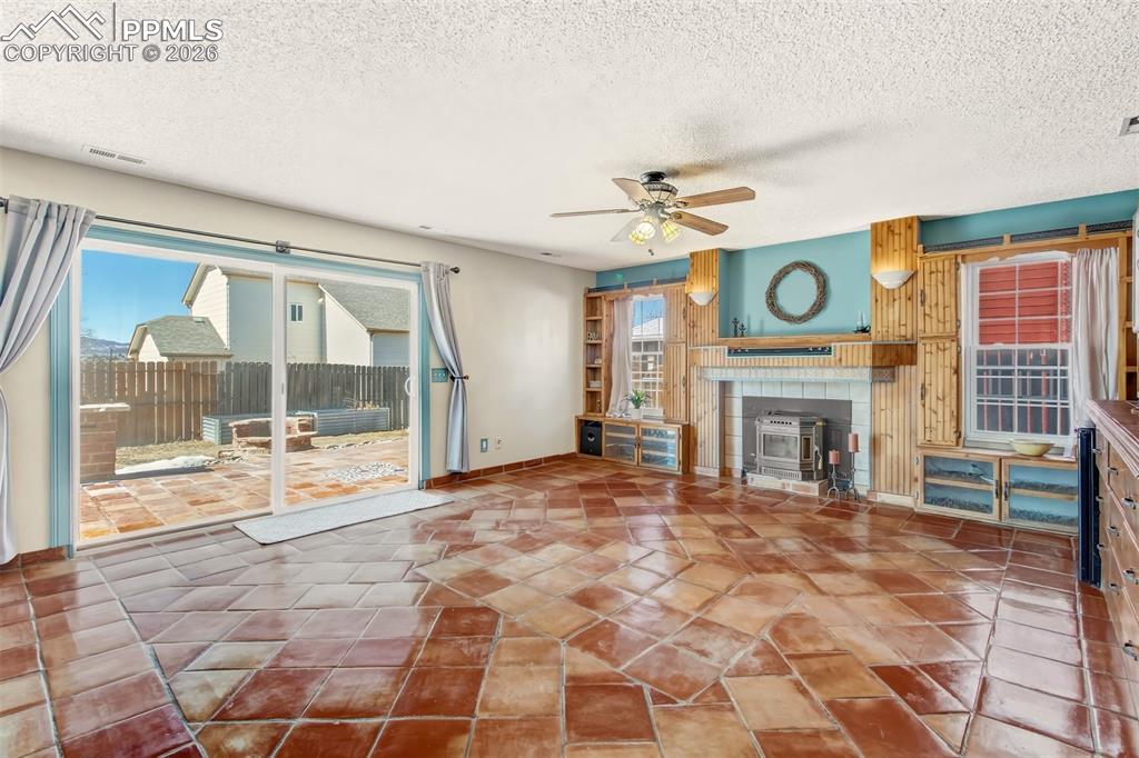 Wall to wall tile floors, Whitfield pellet stove and beautiful built-ins. 