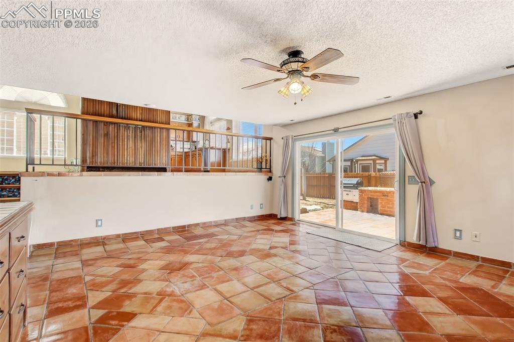 Spacious backyard access through the large sliding glass door. 