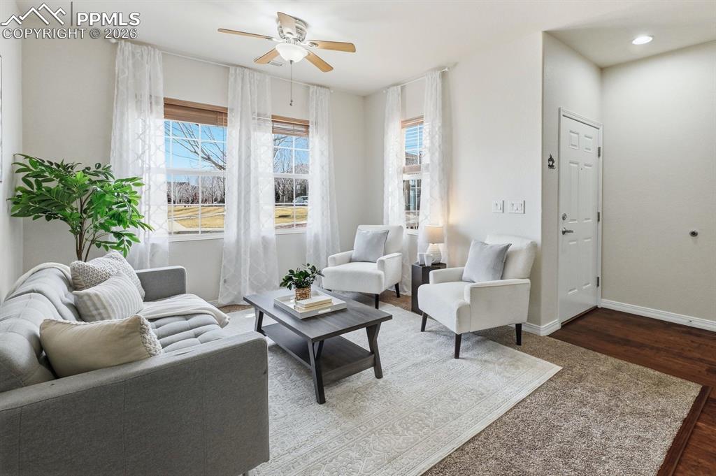 Light-filled living area with open flow — ideal for everyday comfort or hosting friends after a neighborhood stroll.