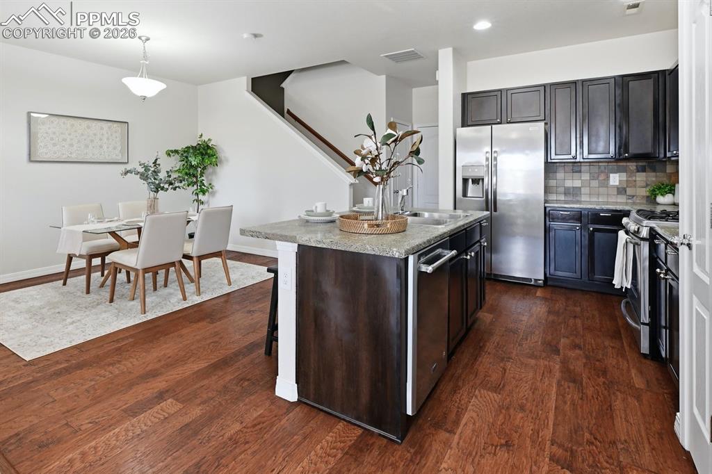 Spacious kitchen connects effortlessly to the dining area.