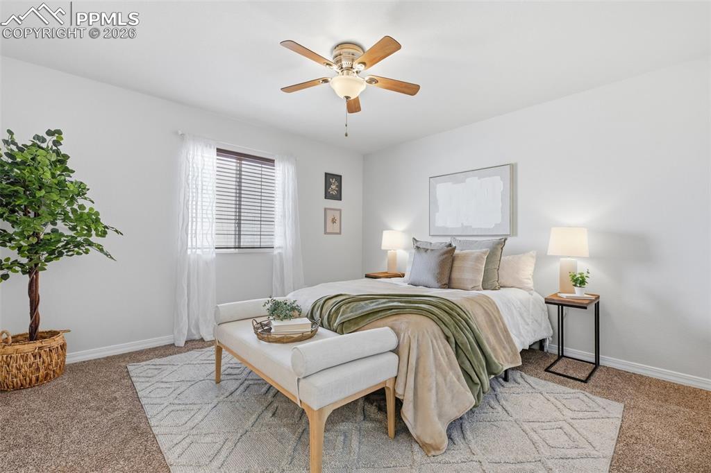 Spacious primary retreat with natural light and room to unwind.