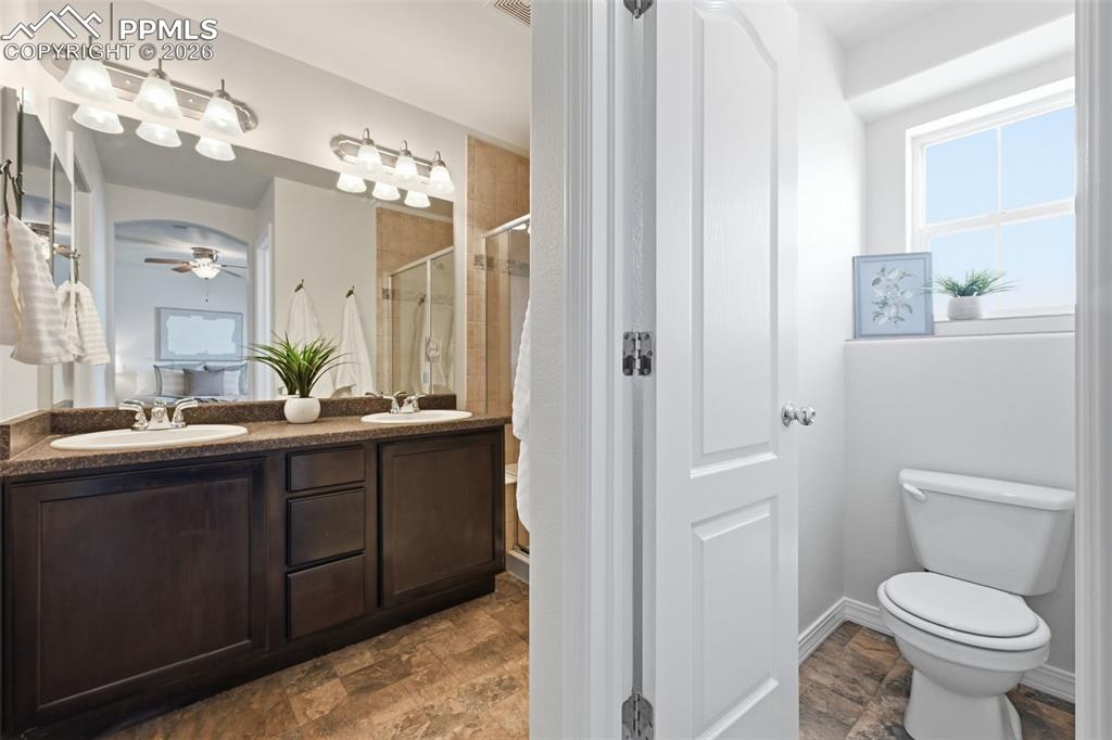 Primary bath paired with a walk-in closet — offering both convenience and valuable storage in the private suite.