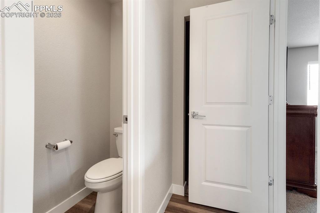 Bathroom featuring dark wood-style flooring