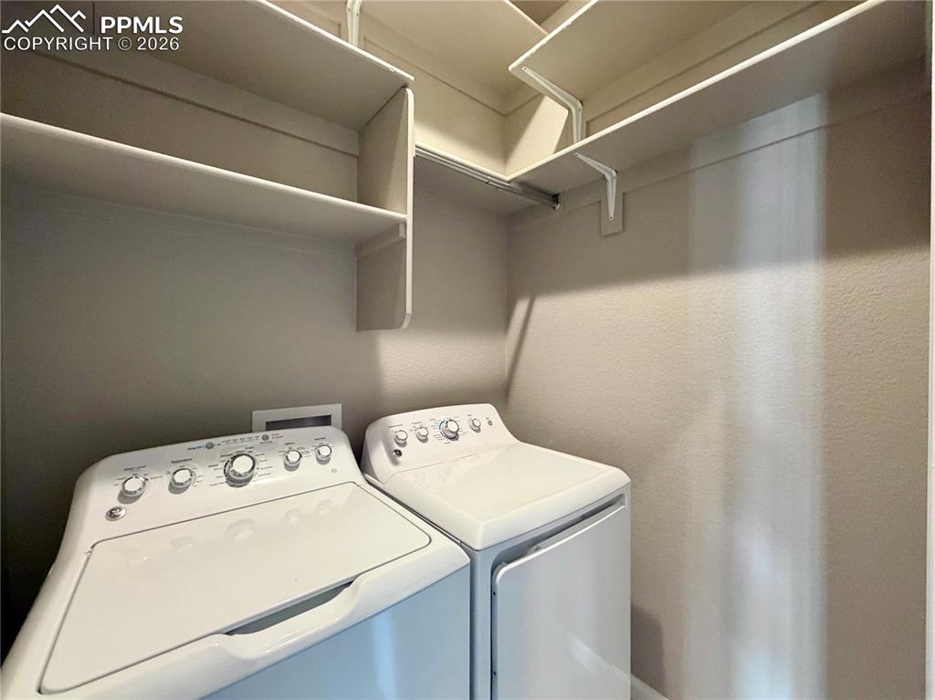 Additional Shelving in Laundry, Washer and Dryer included. 