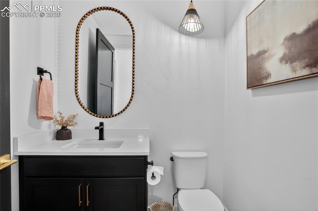 Main floor Powder Room off Foyer