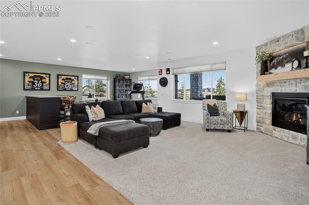 Basement Recreation Room with stone fireplace