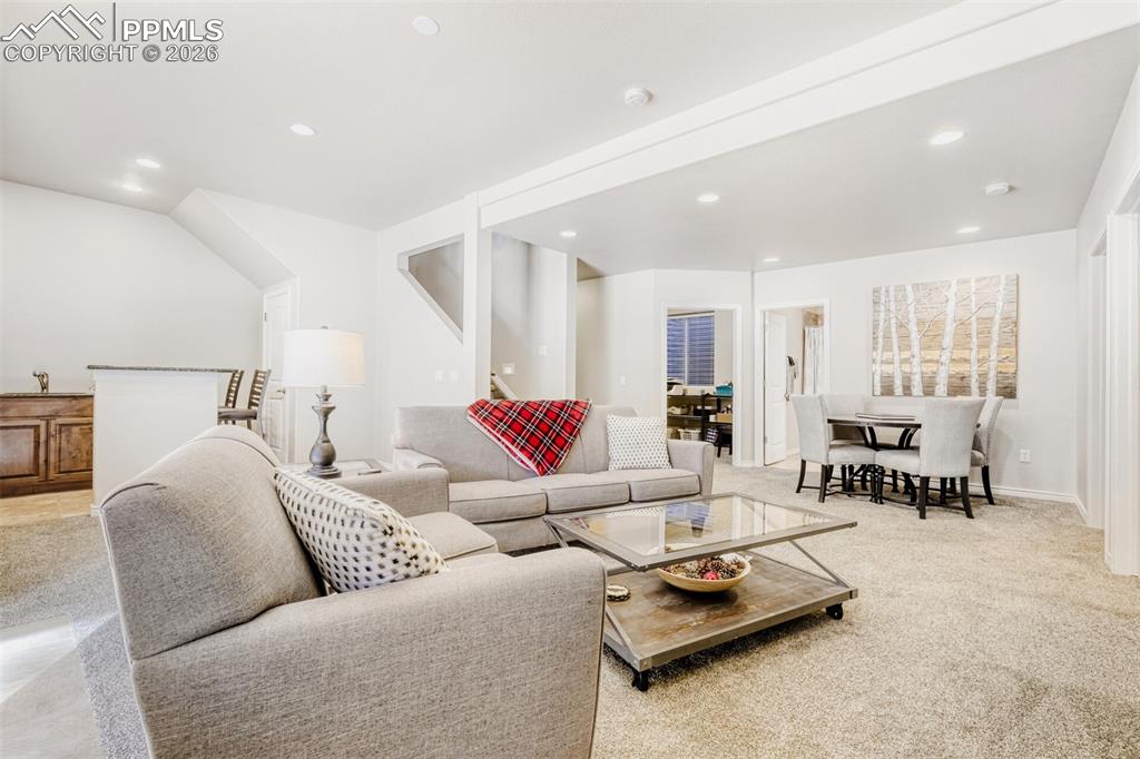 Basement Living area with game area and complete wet bar