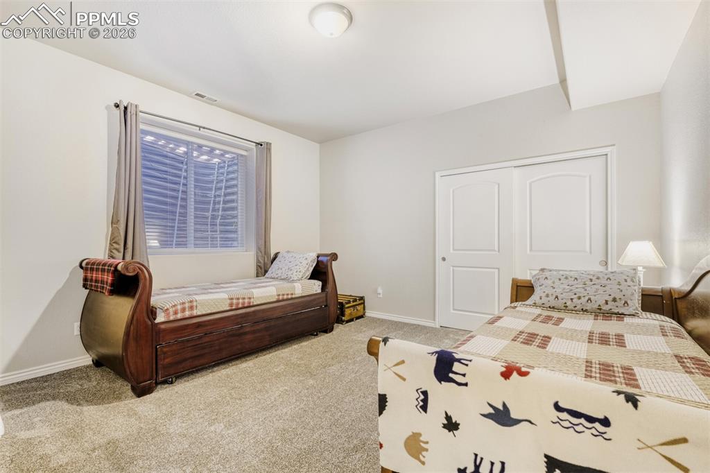 4th basement bedroom with brand new carpet