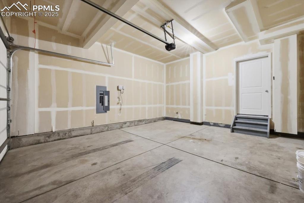 Garage featuring electric panel