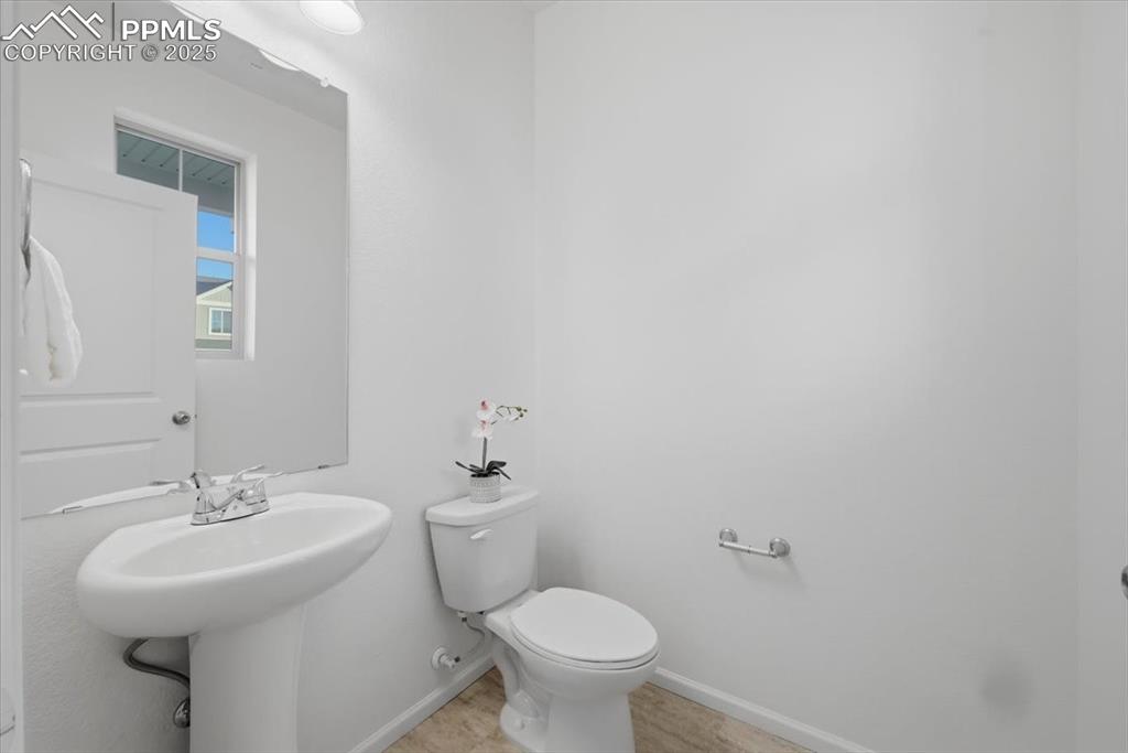 Bathroom featuring baseboards