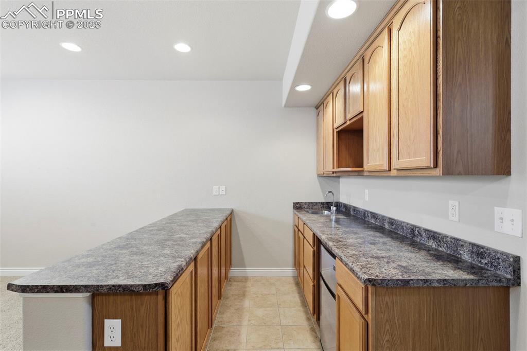 Great Room in Basement Level with Wet Bar