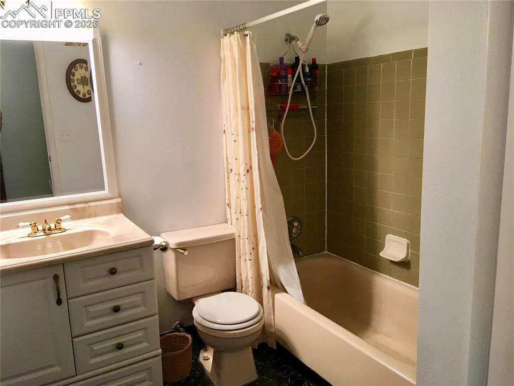 Upper level full bath is accessible from primary bedroom and/or the hallway.