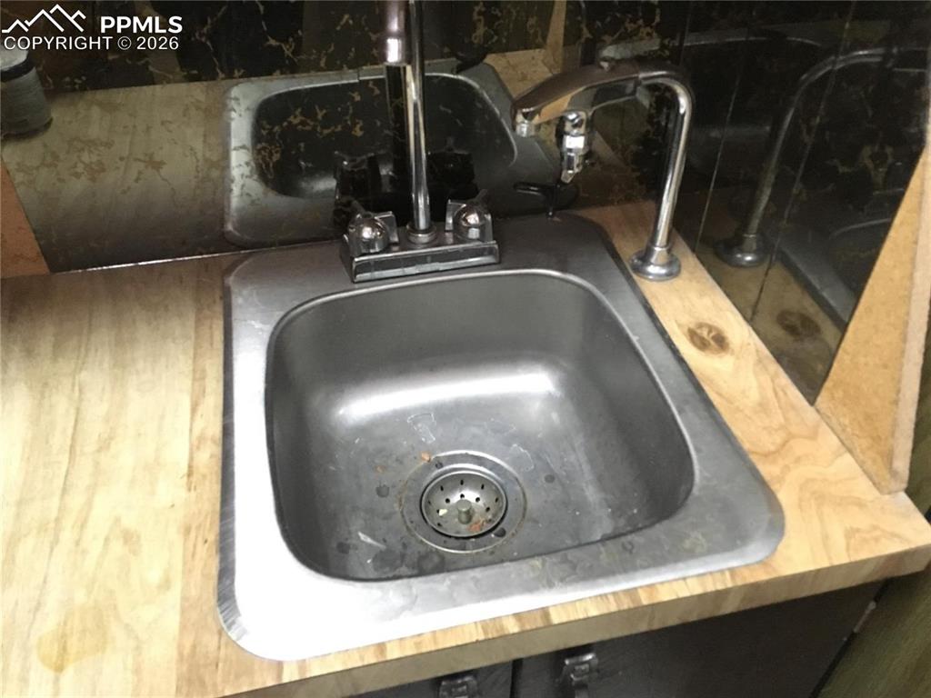 4th level basement includes a wet bar.