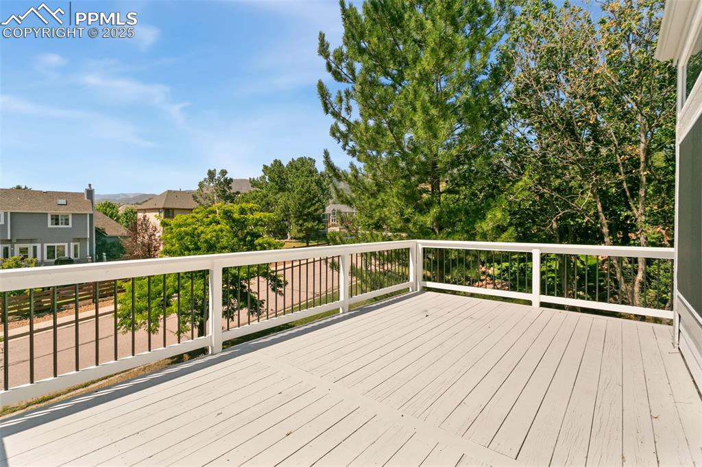Wooden deck with a residential view