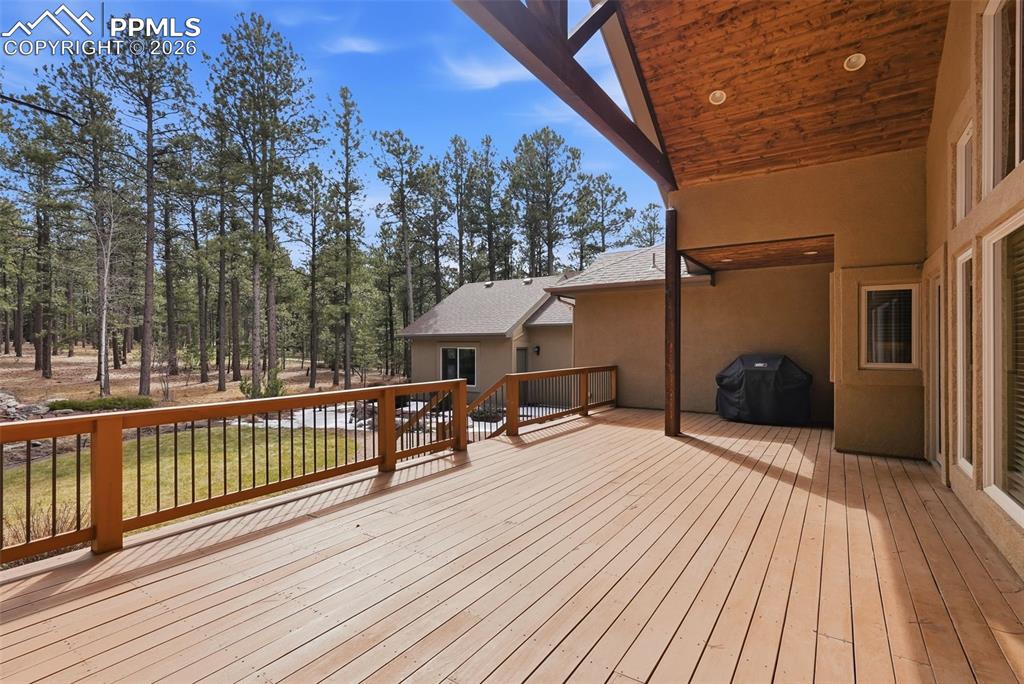 Partially covered deck with gas grill connection and wired for outdoor speakers