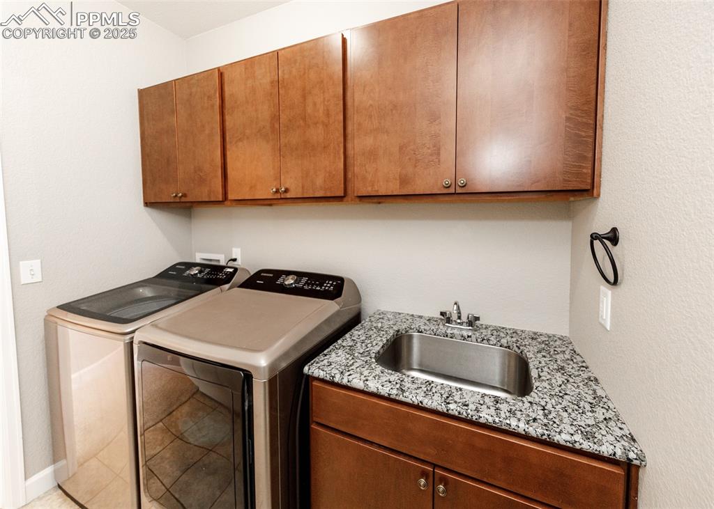 Convenient sink in the laundry area.