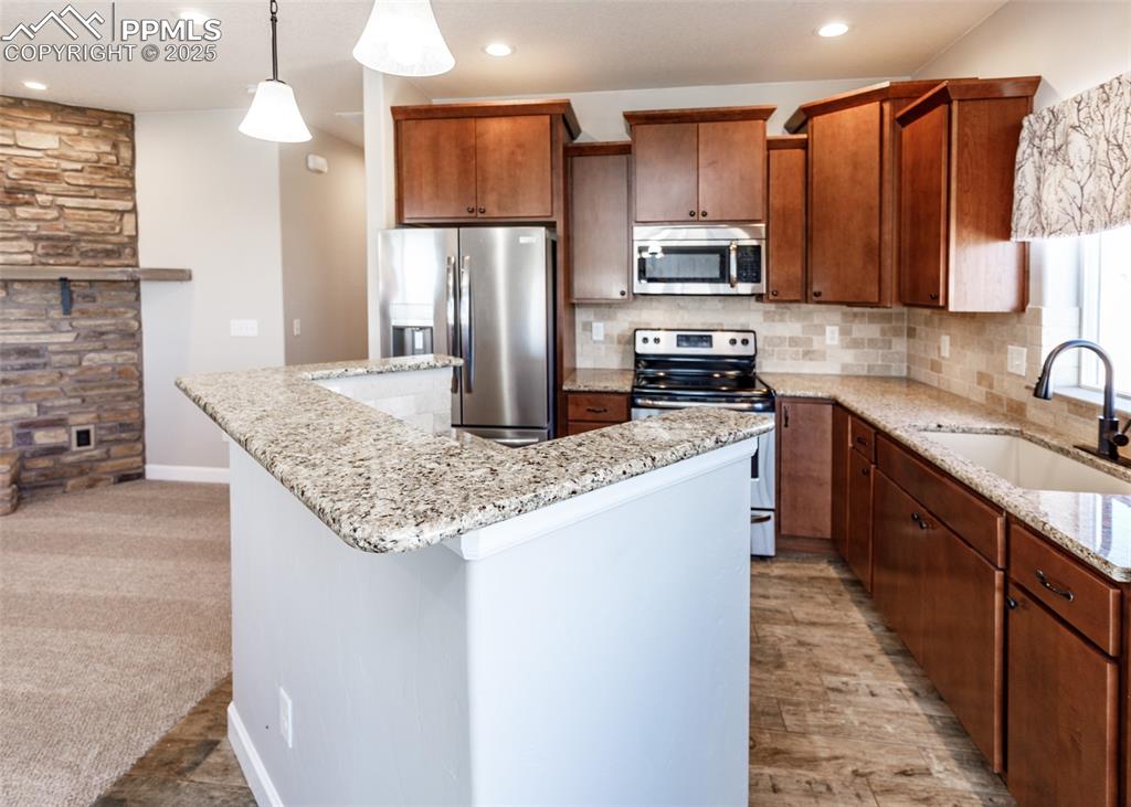 Great kitchen with stainless appliances and granite countertops.