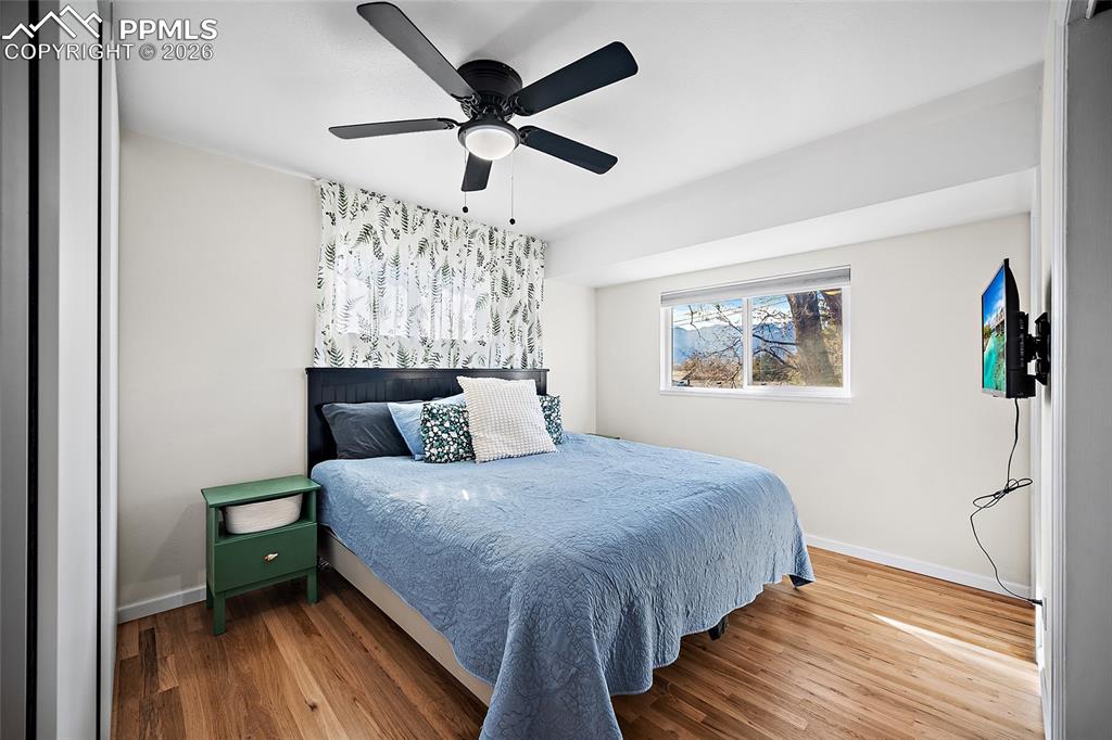Primary bedroom with mountain views.