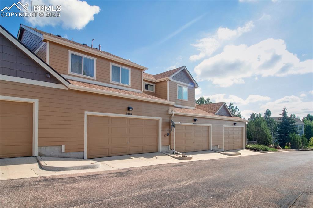 Garage view of the back of the townhome