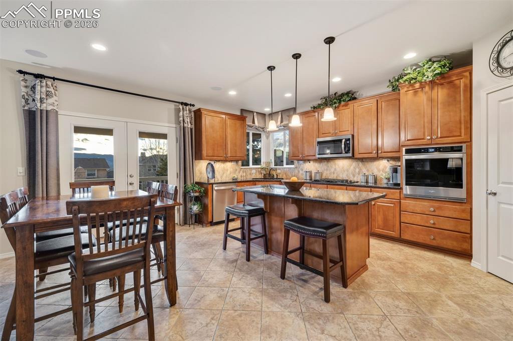 Walk out to the covered rear deck 